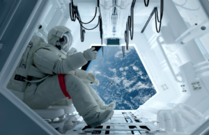 astronaut in space, sat by a window in a shuttle